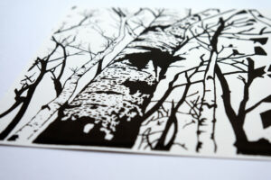 Detail of black and white art print by Till Steinberger showing stylized birch forest