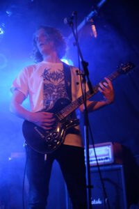 Till Steinberger performing live with guitar at Viper Room in Vienna